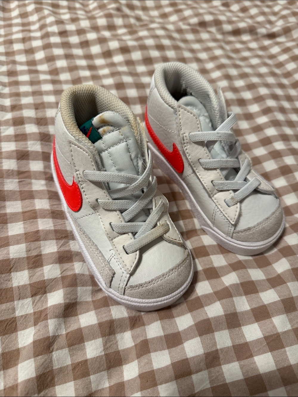 Nike Kids White High-Top Sneakers with Bright Red Swoosh